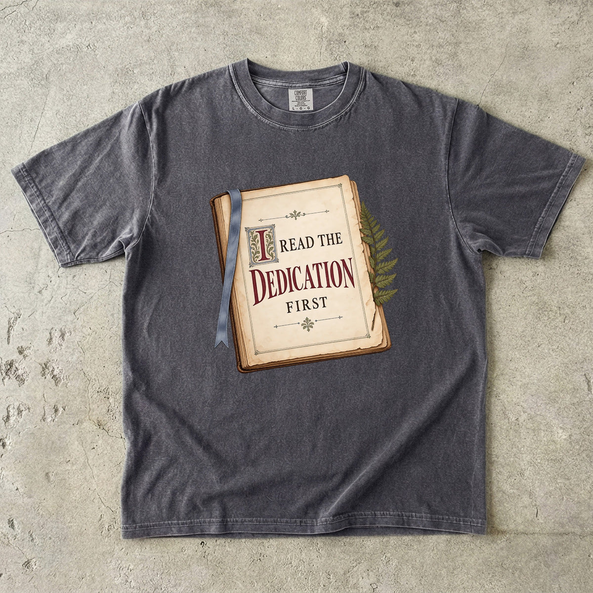 Pepper reader T-shirt with “I Read the Dedication First” inside an illustrated old book