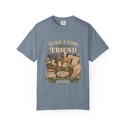 Leave a Story, Take a Friend book club T-shirt with gift basket of books and flowers on Blue Jean.