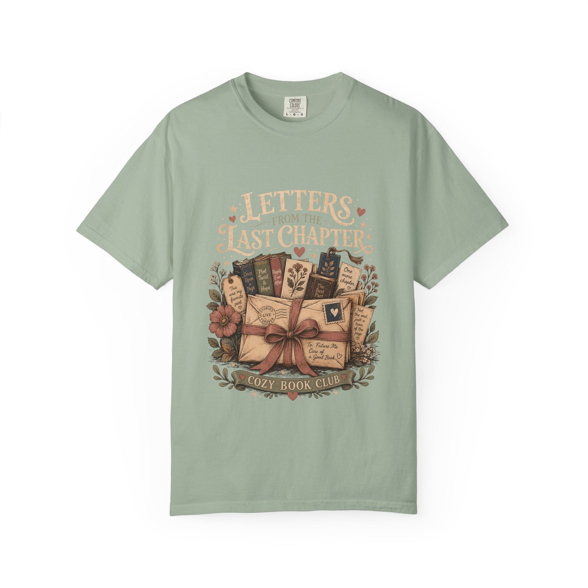 Front view of the Letters From the Last Chapter book club illustration printed on a Bay Comfort Colors T-shirt