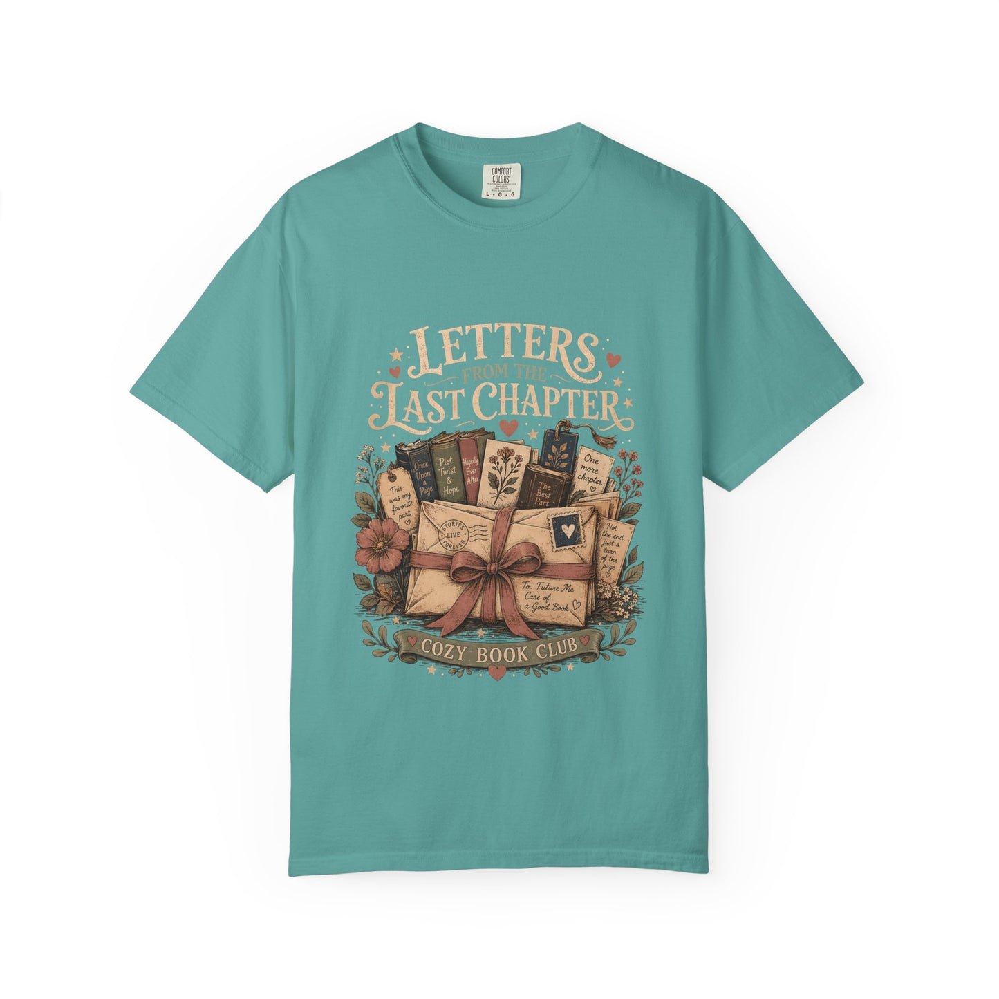 Front view of the Letters From the Last Chapter book club illustration printed on a Seafoam Comfort Colors T-shirt. 