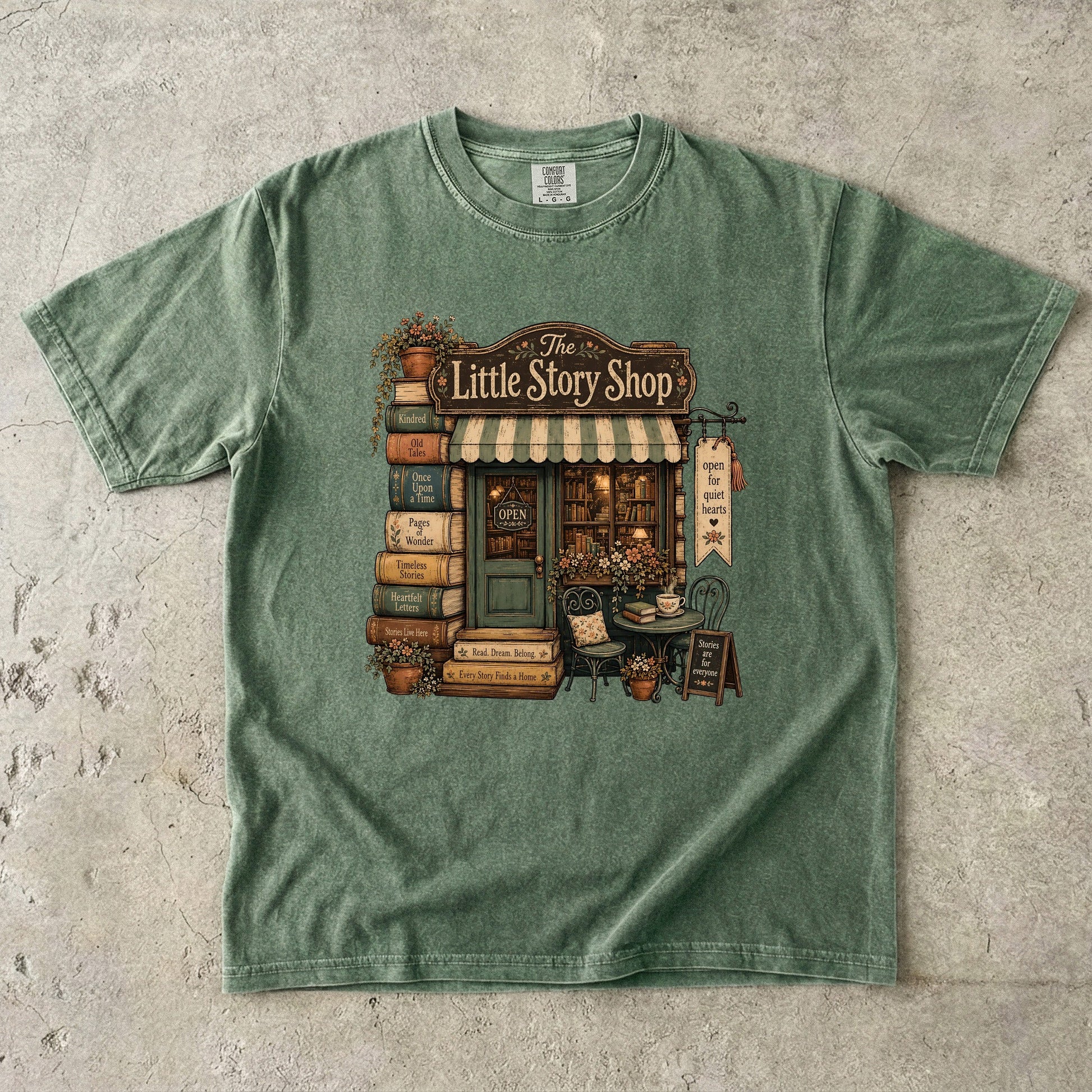 The Little Story Shop bookshop T-shirt with a tiny vintage bookstore, books and flowers on Moss.