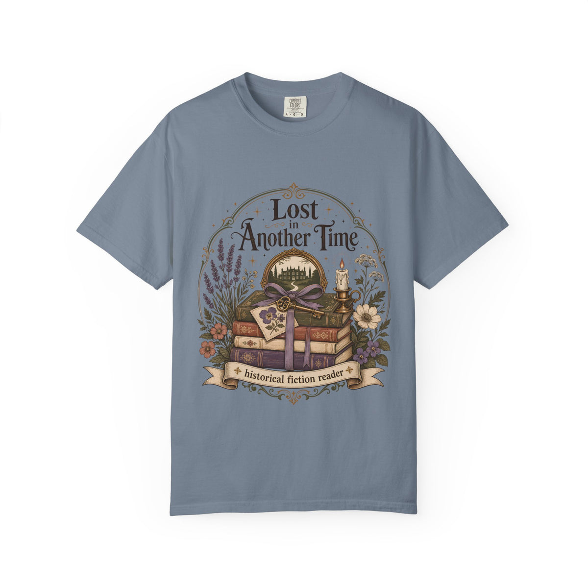 Lost in Another Time historical fiction reader T-shirt in Blue Jean, featuring vintage books, an antique key, candle, flowers and a country house.