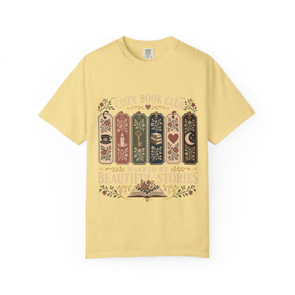 Marked by Beautiful Stories book club T-shirt in Butter featuring floral bookmarks, books and vintage reading motifs