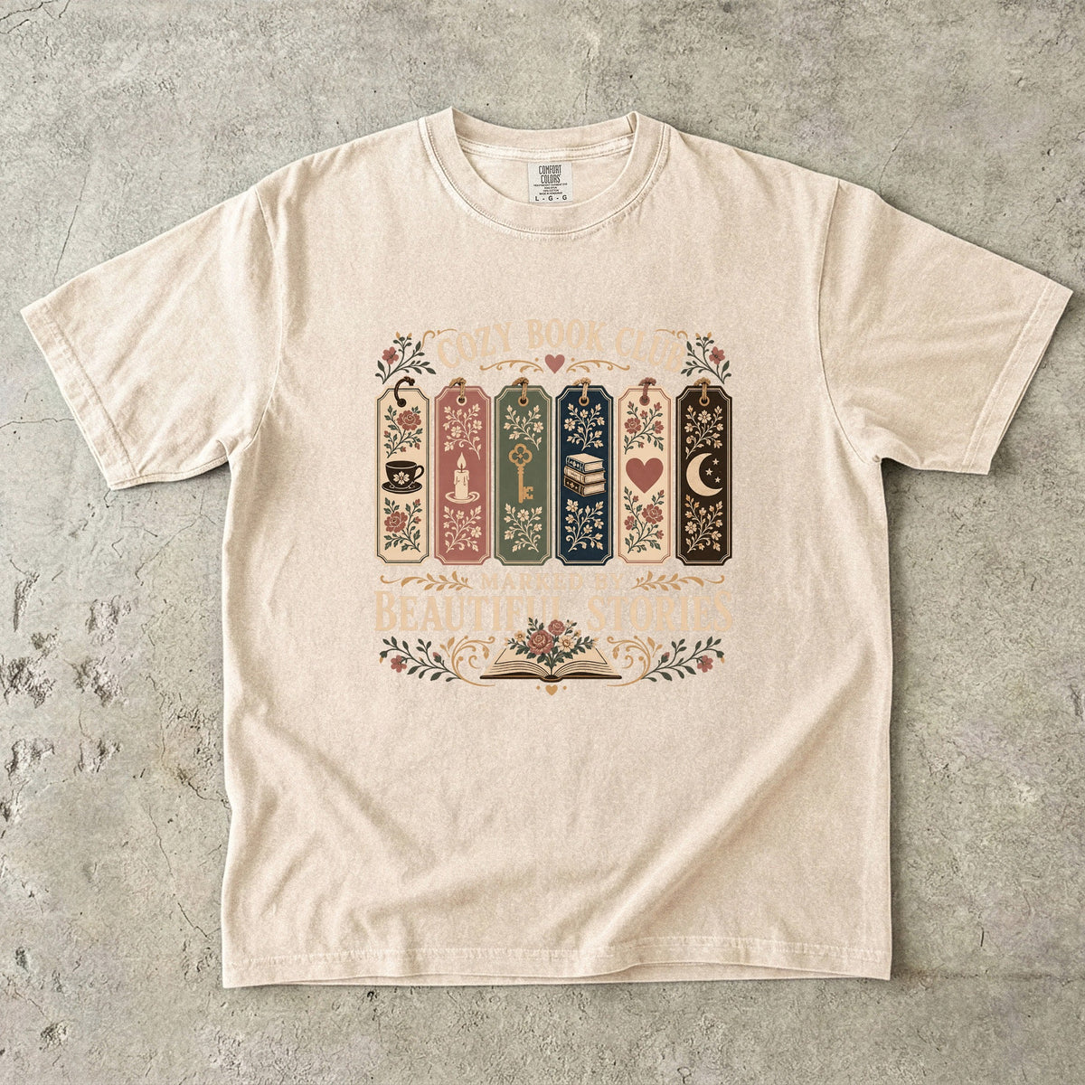 Marked by Beautiful Stories book club T-shirt in Ivory featuring floral bookmarks, books and vintage reading motifs
