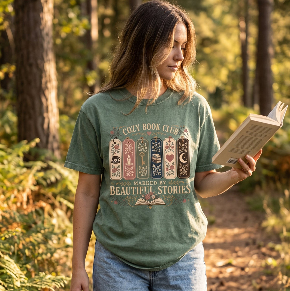 Marked by Beautiful Stories book club T-shirt featuring vintage floral bookmarks, an open book and reading motifs