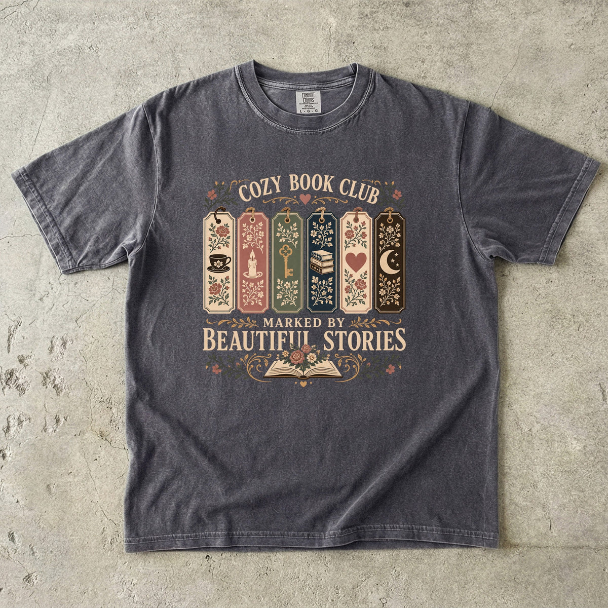 Marked by Beautiful Stories book club T-shirt in Pepper featuring floral bookmarks, books and vintage reading motifs
