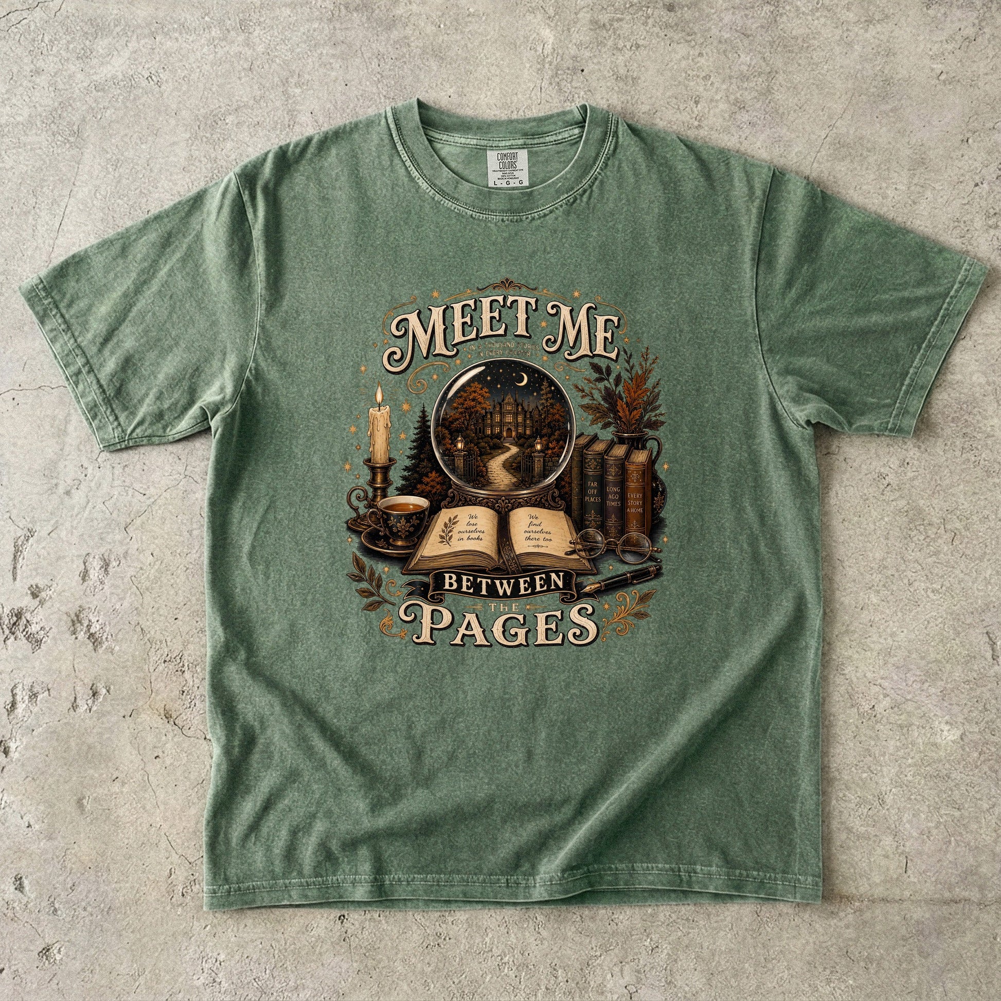 Moss Comfort Colors book lover T-shirt featuring vintage books, candlelight and the Meet Me Between the Pages design.