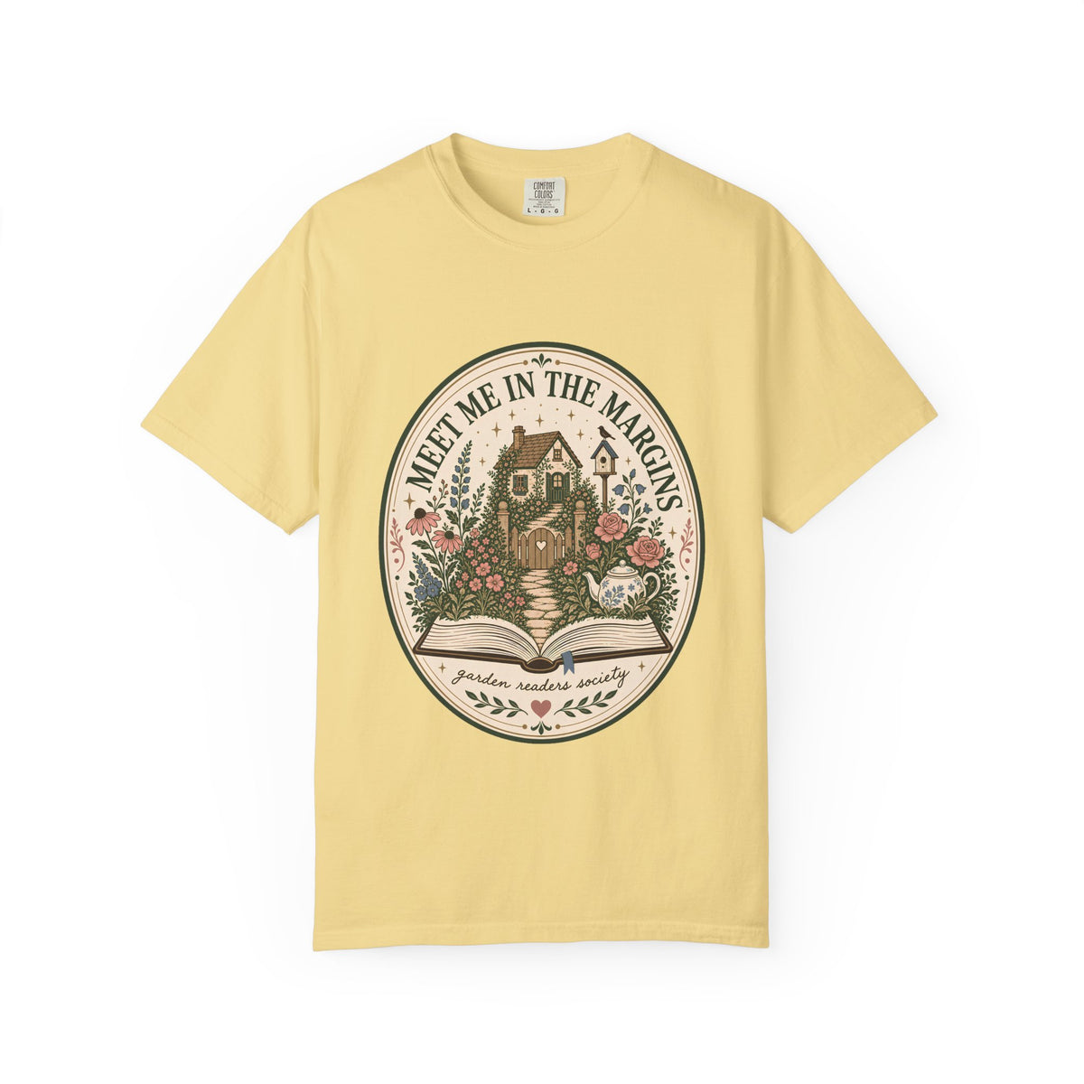 Meet Me in the Margins garden reader T-shirt featuring a cottage garden, flowers, teapot and open book design on Butter.