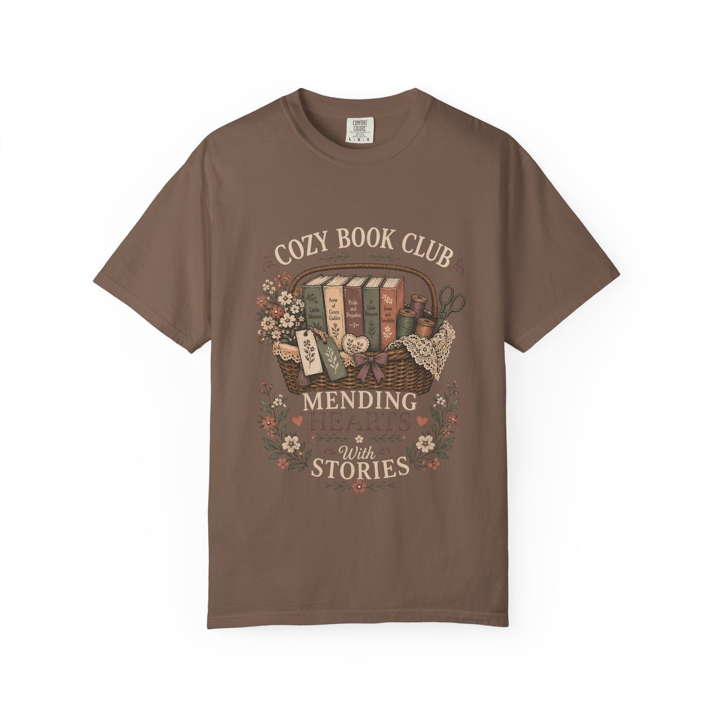 Mending Hearts With Stories book club T-shirt in Espresso featuring classic books, sewing notions, flowers and a woven basket