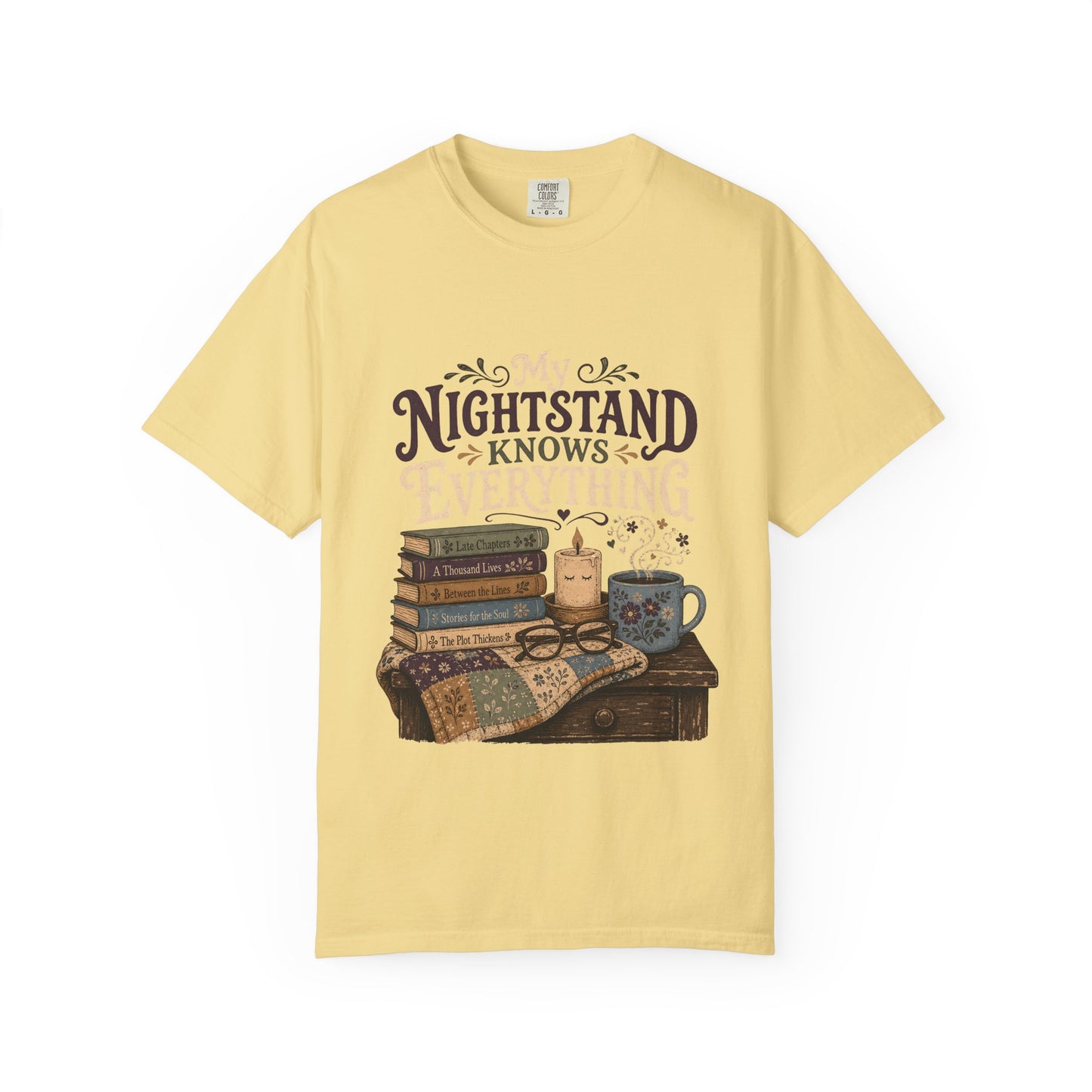 My Nightstand Knows Everything reading T-shirt in Butter with stacked books, reading glasses, a candle and floral mug