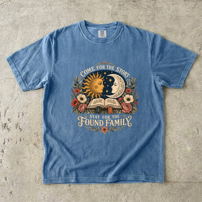 Blue Jean Comfort Colors found family book shirt featuring vintage sun, moon, flowers and open book artwork.