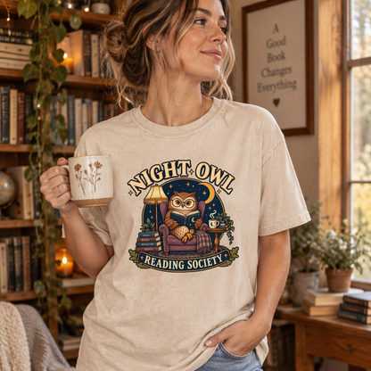 T-shirt featuring “Night Owl Reading Society” in a lifestyle presentation.