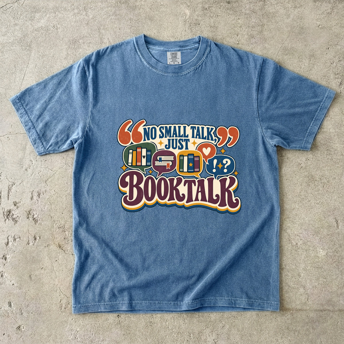 Blue Jean book lover T-shirt with “No Small Talk, Just Book Talk” and colourful book conversation bubbles