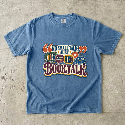 Blue Jean book lover T-shirt with “No Small Talk, Just Book Talk” and colourful book conversation bubbles