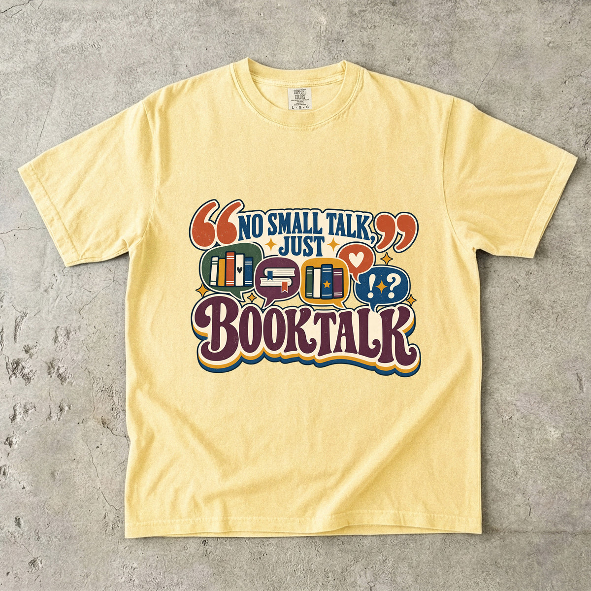 Butter book lover T-shirt with “No Small Talk, Just Book Talk” and colourful book conversation bubbles
