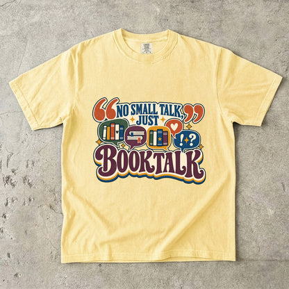 Butter book lover T-shirt with “No Small Talk, Just Book Talk” and colourful book conversation bubbles