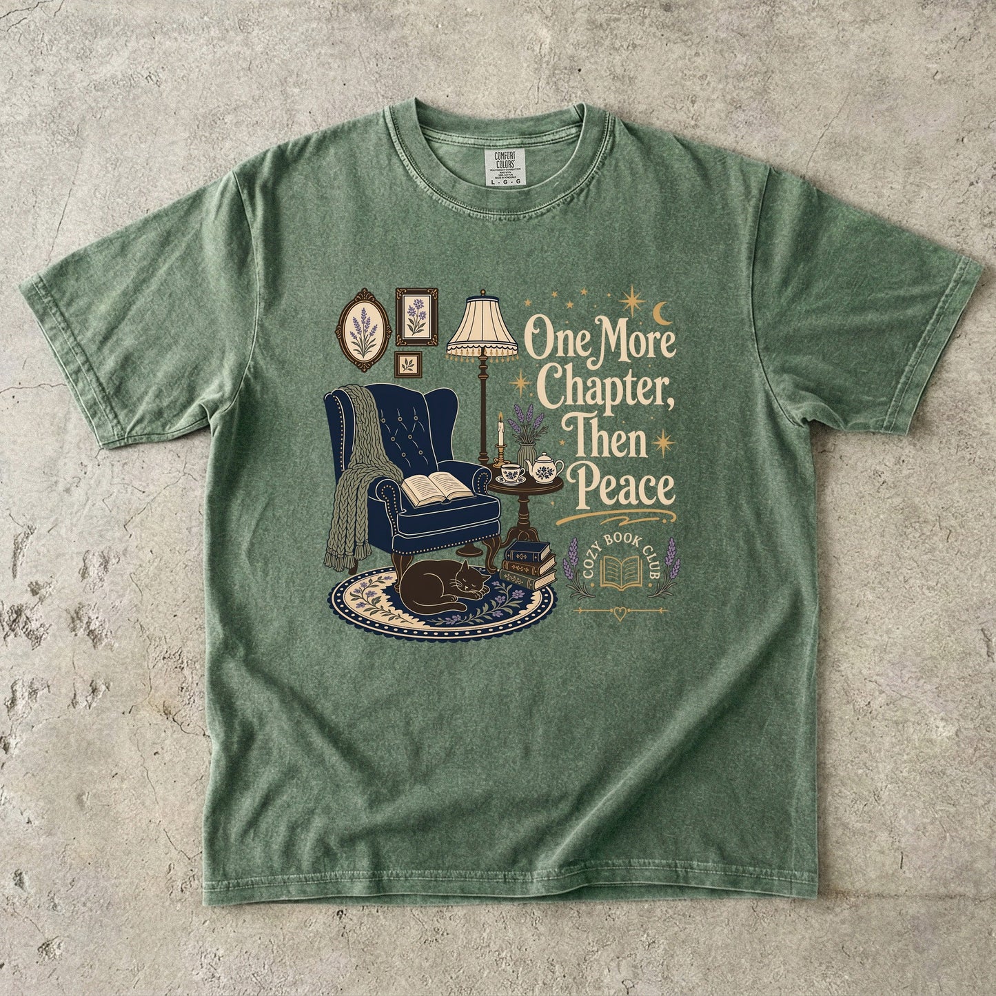 One More Chapter, Then Peace cozy reader T-shirt with vintage reading nook design on Moss.