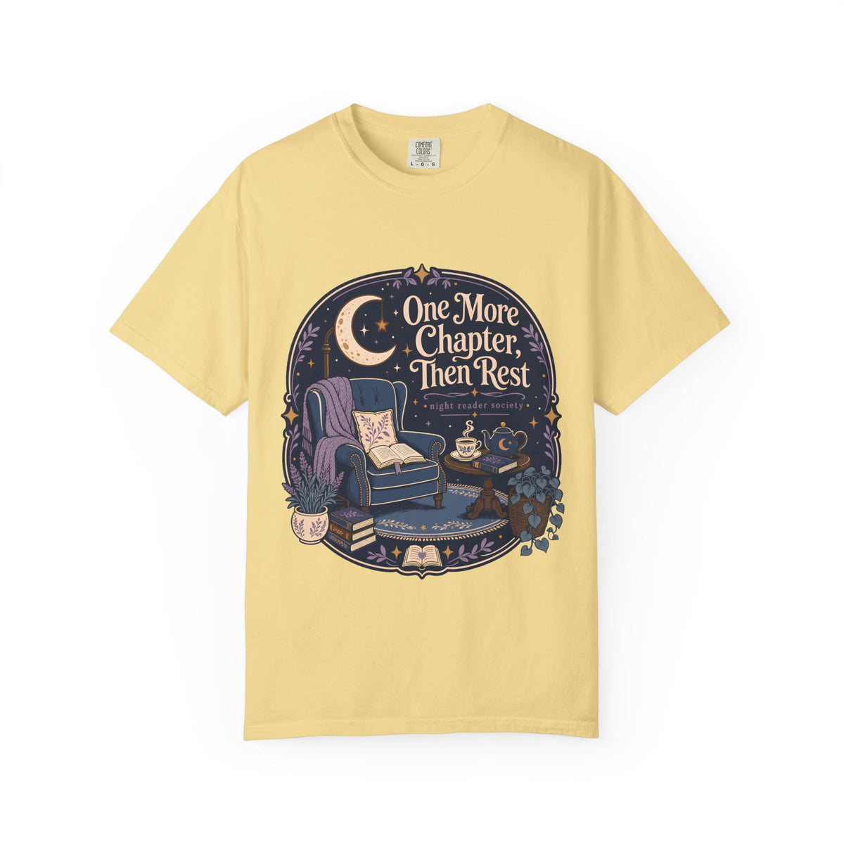 One More Chapter Then Rest night reader T-shirt with cozy armchair, open book, moon, teapot and botanical details on Butter.