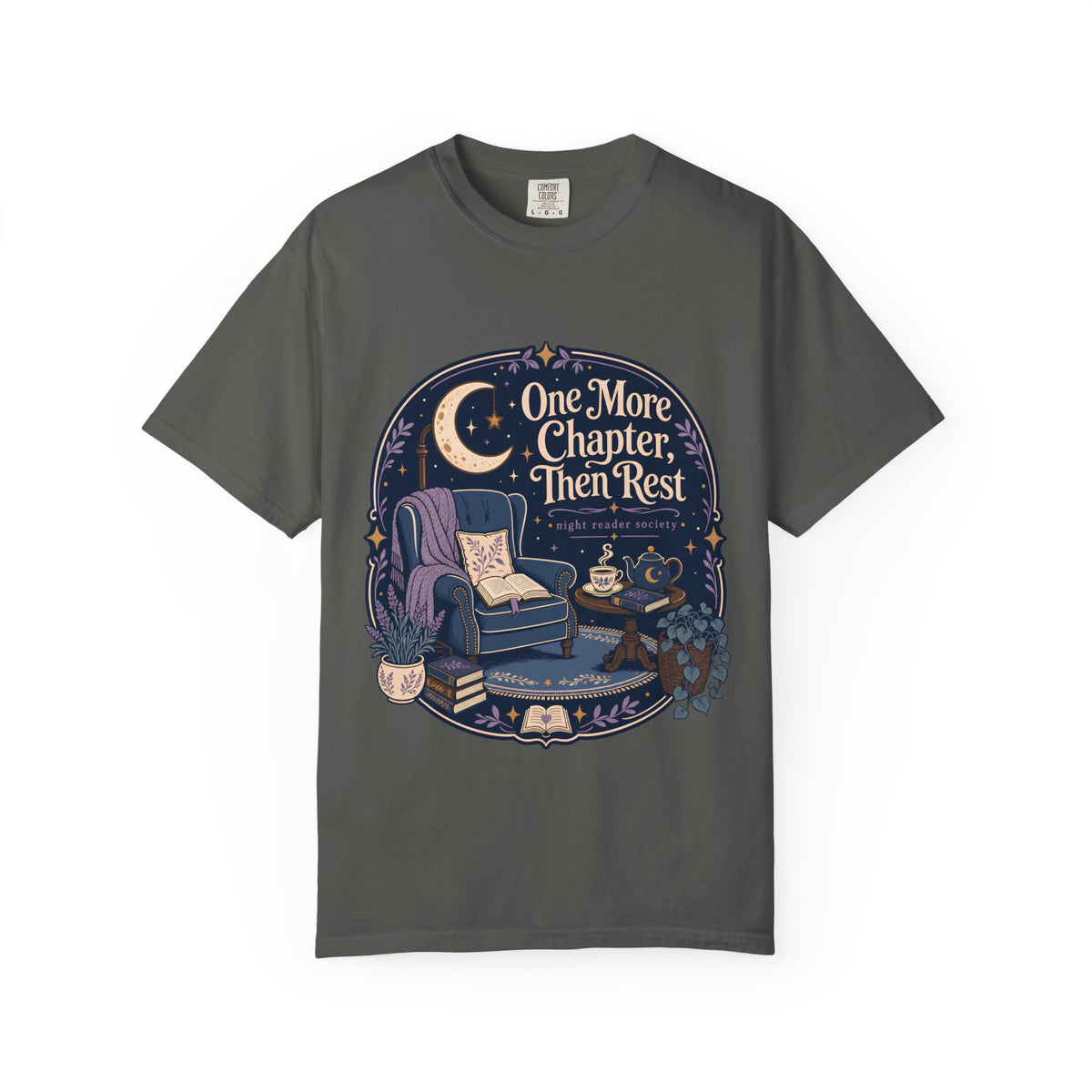 One More Chapter Then Rest night reader T-shirt with cozy armchair, open book, moon, teapot and botanical details on Pepper.
