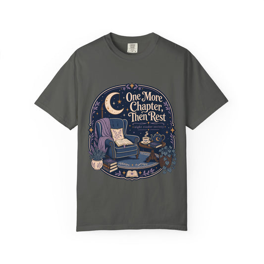One More Chapter Then Rest night reader T-shirt with cozy armchair, open book, moon, teapot and botanical details on Pepper.