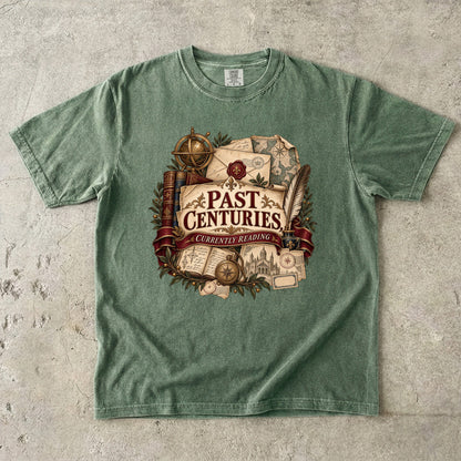 Moss literary T-shirt with “Past Centuries, Currently Reading,” antique-style books, letters and maps
