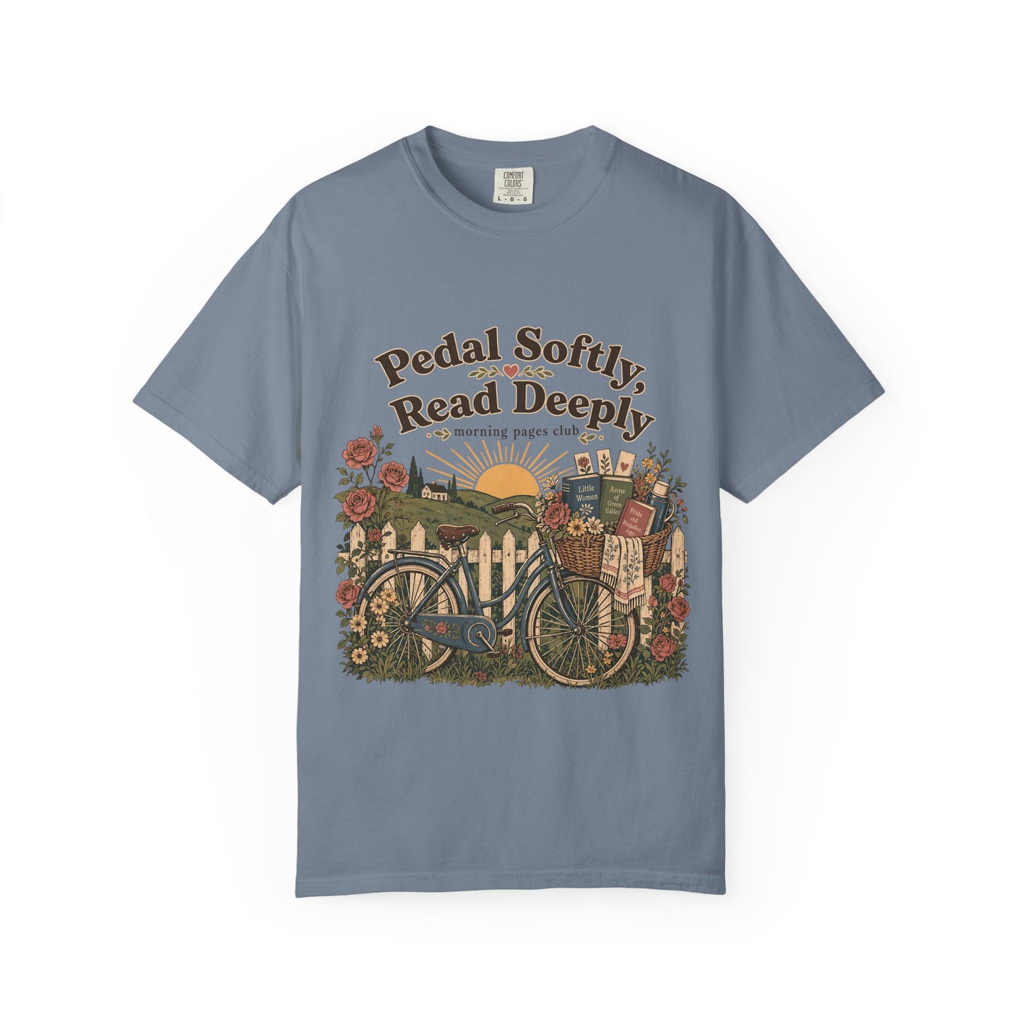 Pedal Softly, Read Deeply book lover T-shirt with vintage bicycle, books and flowers on Blue Jean.