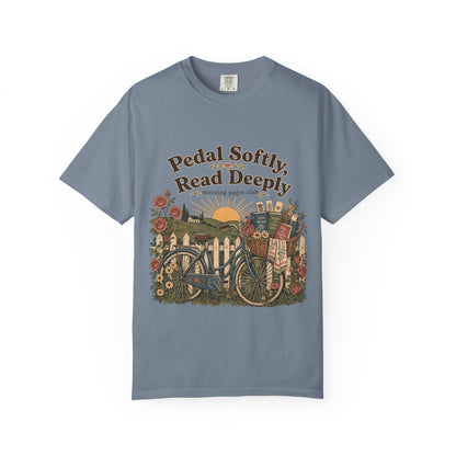 Pedal Softly, Read Deeply book lover T-shirt with vintage bicycle, books and flowers on Blue Jean.