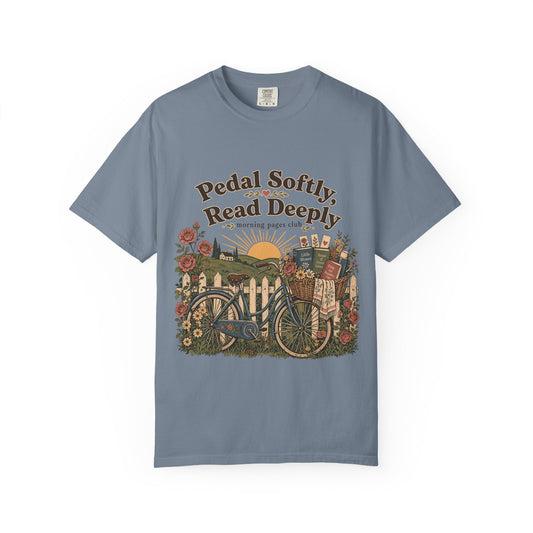 Pedal Softly, Read Deeply book lover T-shirt with vintage bicycle, books and flowers on Blue Jean.