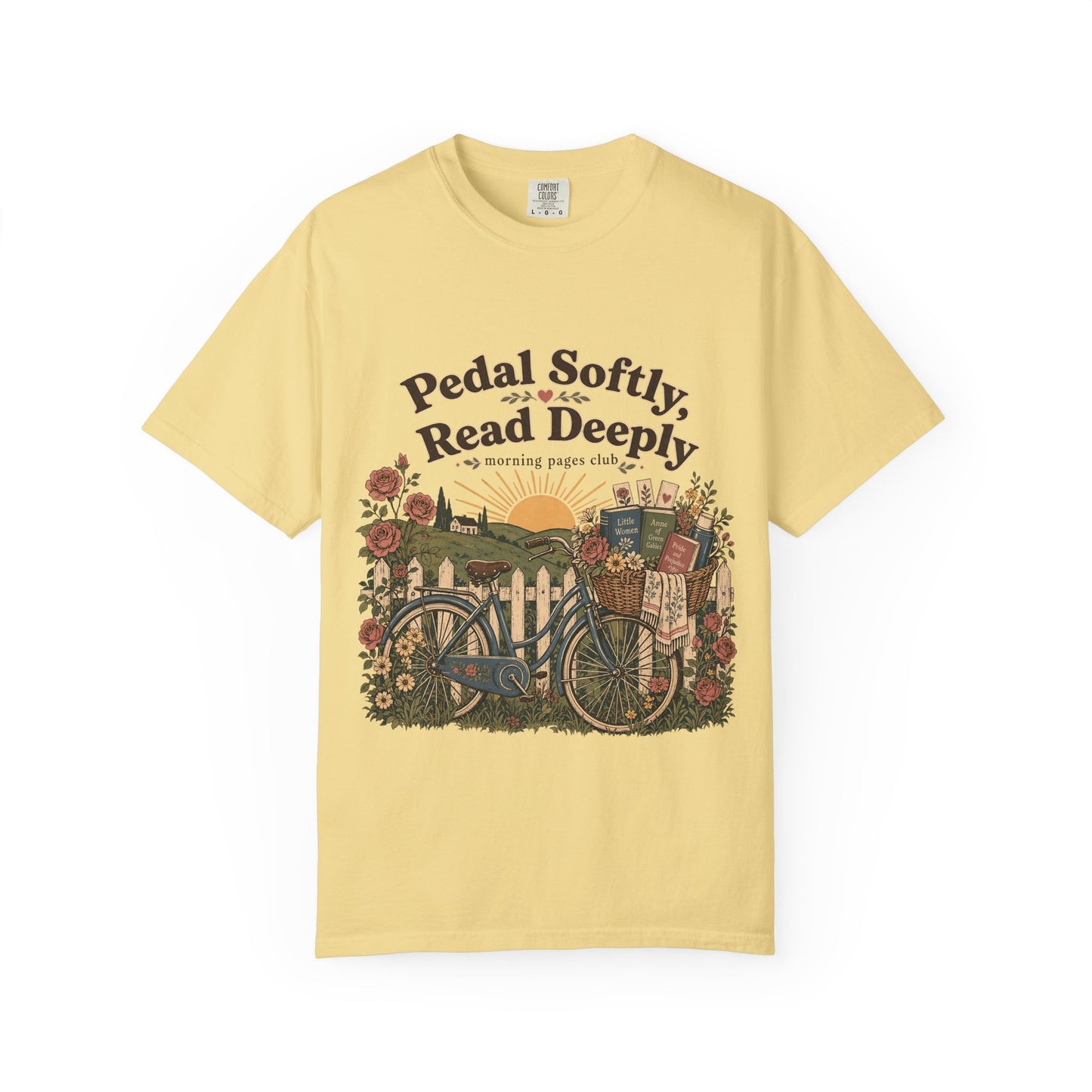 Pedal Softly, Read Deeply book lover T-shirt with vintage bicycle, books and flowers on Butter.