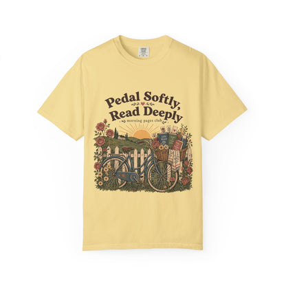 Pedal Softly, Read Deeply book lover T-shirt with vintage bicycle, books and flowers on Butter.