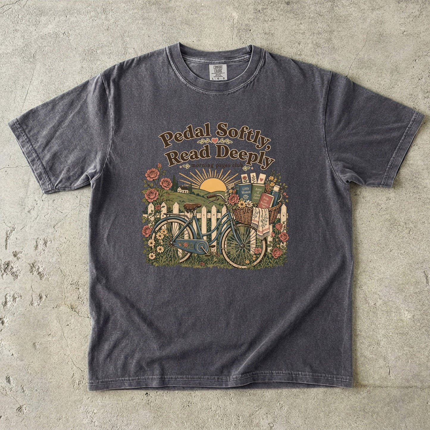 Pedal Softly, Read Deeply book lover T-shirt with vintage bicycle, books and flowers on Pepper.