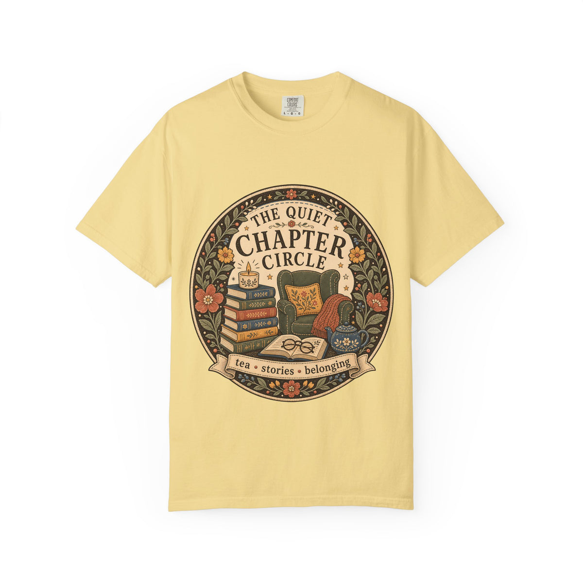 Quiet Chapter Circle book club T-shirt with armchair, stacked books, teapot and floral reading design on Butter.