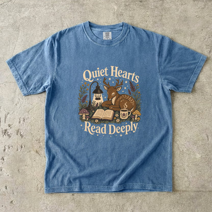 Front view of the Blue Jean Comfort Colors® Book Lover T-shirt featuring a vintage woodland deer, book and tea illustration.