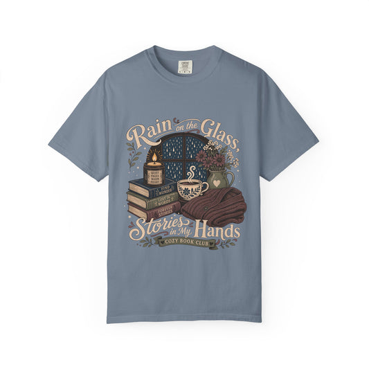Rain on the Glass rainy day reading T-shirt with books, tea and candle design on Blue Jean.