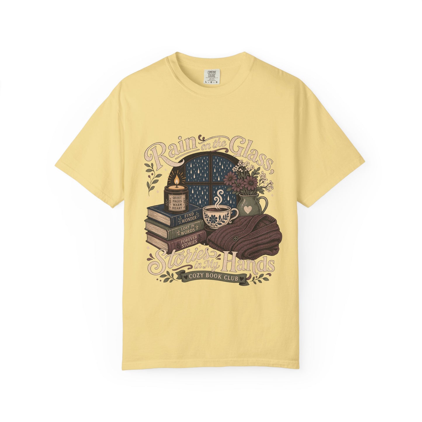 Rain on the Glass rainy day reading T-shirt with books, tea and candle design on Butter.