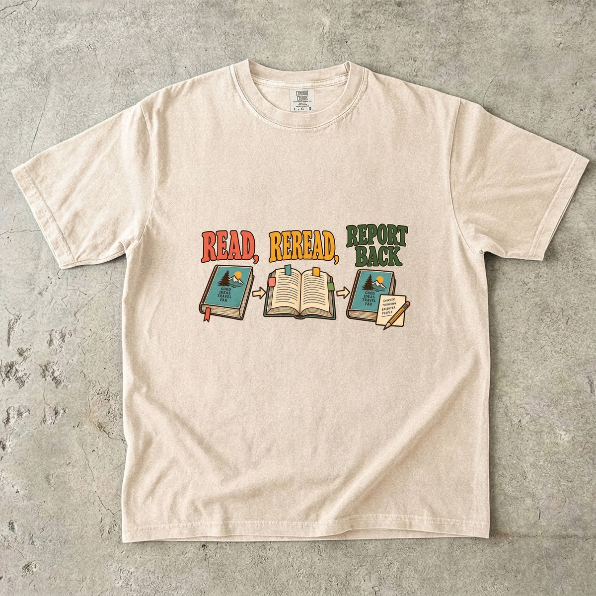 Ivory book club T-shirt with “Read, Reread, Report Back” above three illustrated book moments