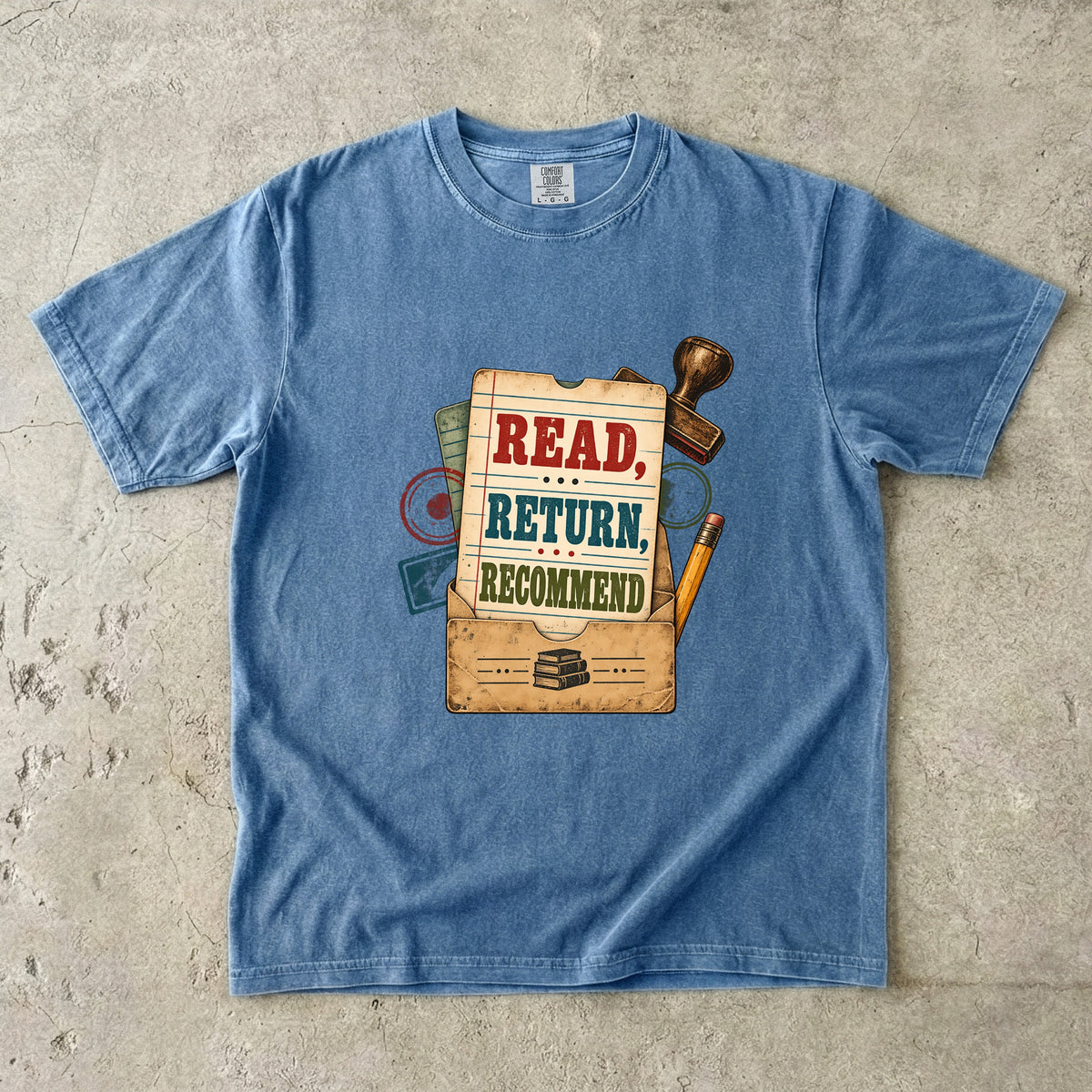 Blue Jean library lover T-shirt with “Read, Return, Recommend” on a vintage library-style card