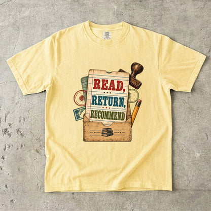 Butter library lover T-shirt with “Read, Return, Recommend” on a vintage library-style card