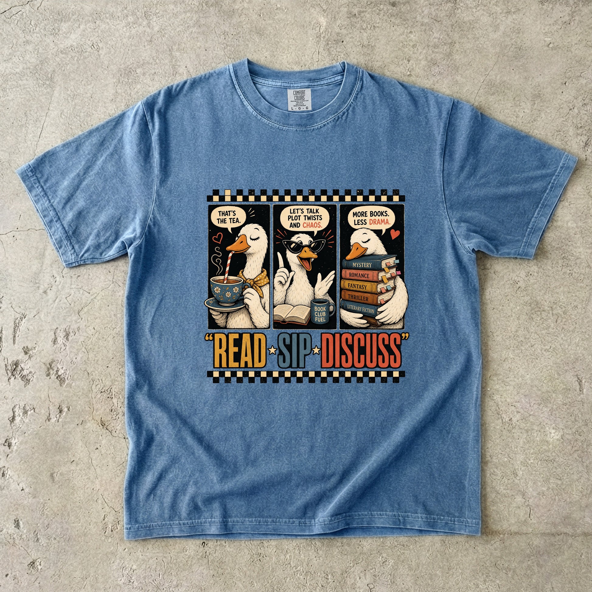 Blue Jean Comfort Colors Read Sip Discuss book club T-shirt featuring funny literary ducks, books and tea.