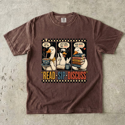 Espresso Comfort Colors book club T-shirt featuring the Read Sip Discuss literary duck design with books and tea.