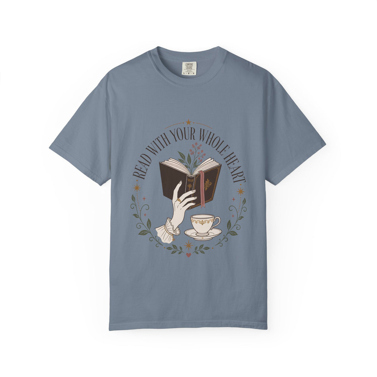Read With Your Whole Heart book lover T-shirt with open book, tea cup, flowers and vintage botanical details on Blue Jean.