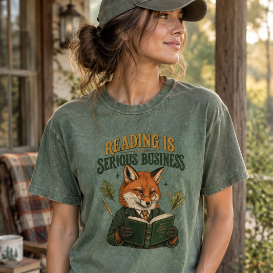 T-shirt featuring “Reading Is Serious Business” in a lifestyle presentation.