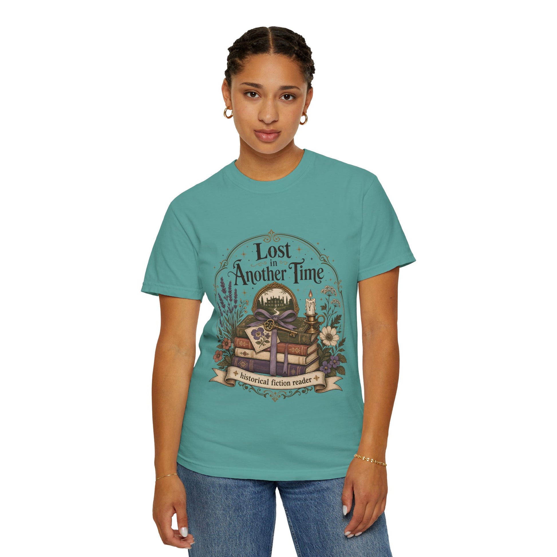 Model wearing a seafoam Comfort Colors reader T-shirt styled for a cosy bookshop visit.