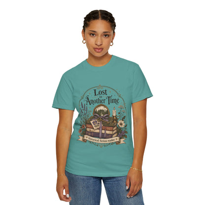 Model wearing a seafoam Comfort Colors reader T-shirt styled for a cosy bookshop visit.