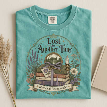 Folded seafoam literary T-shirt featuring vintage bookshop artwork inspired by timeless stories.