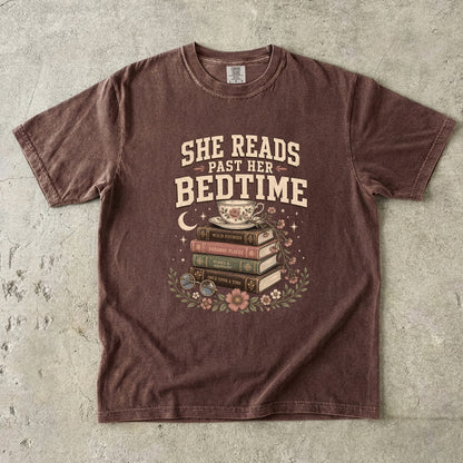 Espresso reading T-shirt featuring She Reads Past Her Bedtime with stacked books, a floral teacup, flowers and crescent moon.
