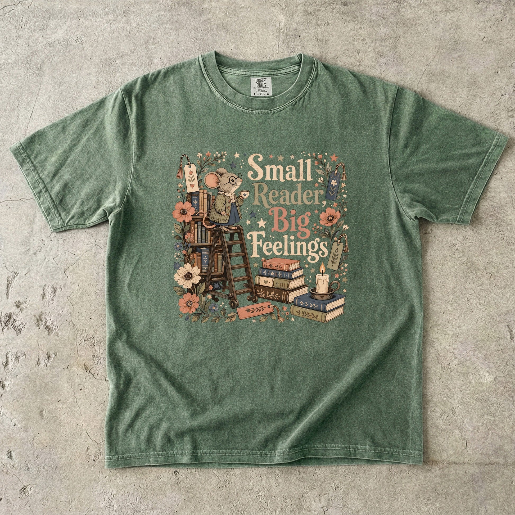 Small Reader, Big Feelings book lover T-shirt in Moss featuring a mouse with books, flowers and a teacup