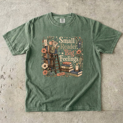 Small Reader, Big Feelings book lover T-shirt in Moss featuring a mouse with books, flowers and a teacup
