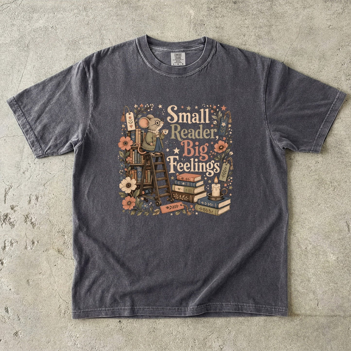 Small Reader, Big Feelings book lover T-shirt in Pepper featuring a mouse with books, flowers and a teacup