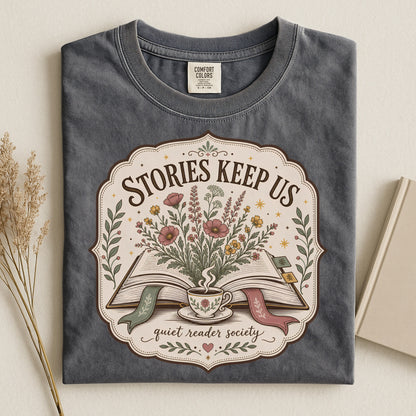 Folded pepper Stories Keep Us reading T-shirt designed for book lovers and readers.